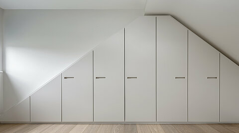 Built-in wardrobe - roof slope to the side